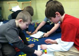 Students with Math tiles