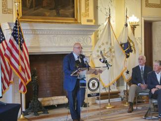 A man standing at a podium.