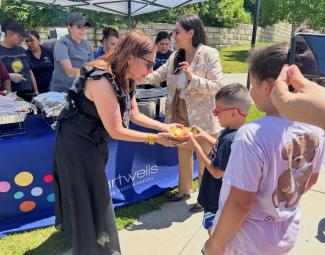 Commissioner Infante-Green serves free meals to children as RIDE kicks off the annual Summer Food Service Program.