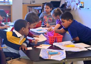 Children at school table